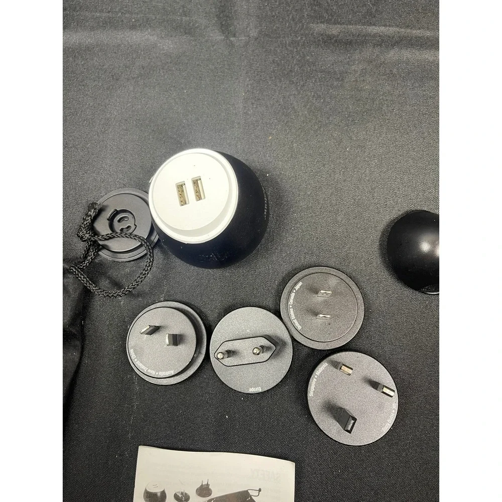 Brookstone USB Pod Travel Adapter Set International Dual Port Black with Pouch
